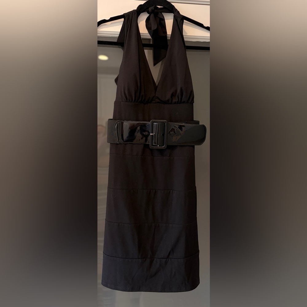 Woman’s belting dress. Ties at the back of the neck.